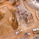 Mine Image with Trucks and Earth Movers - Bird Eye view