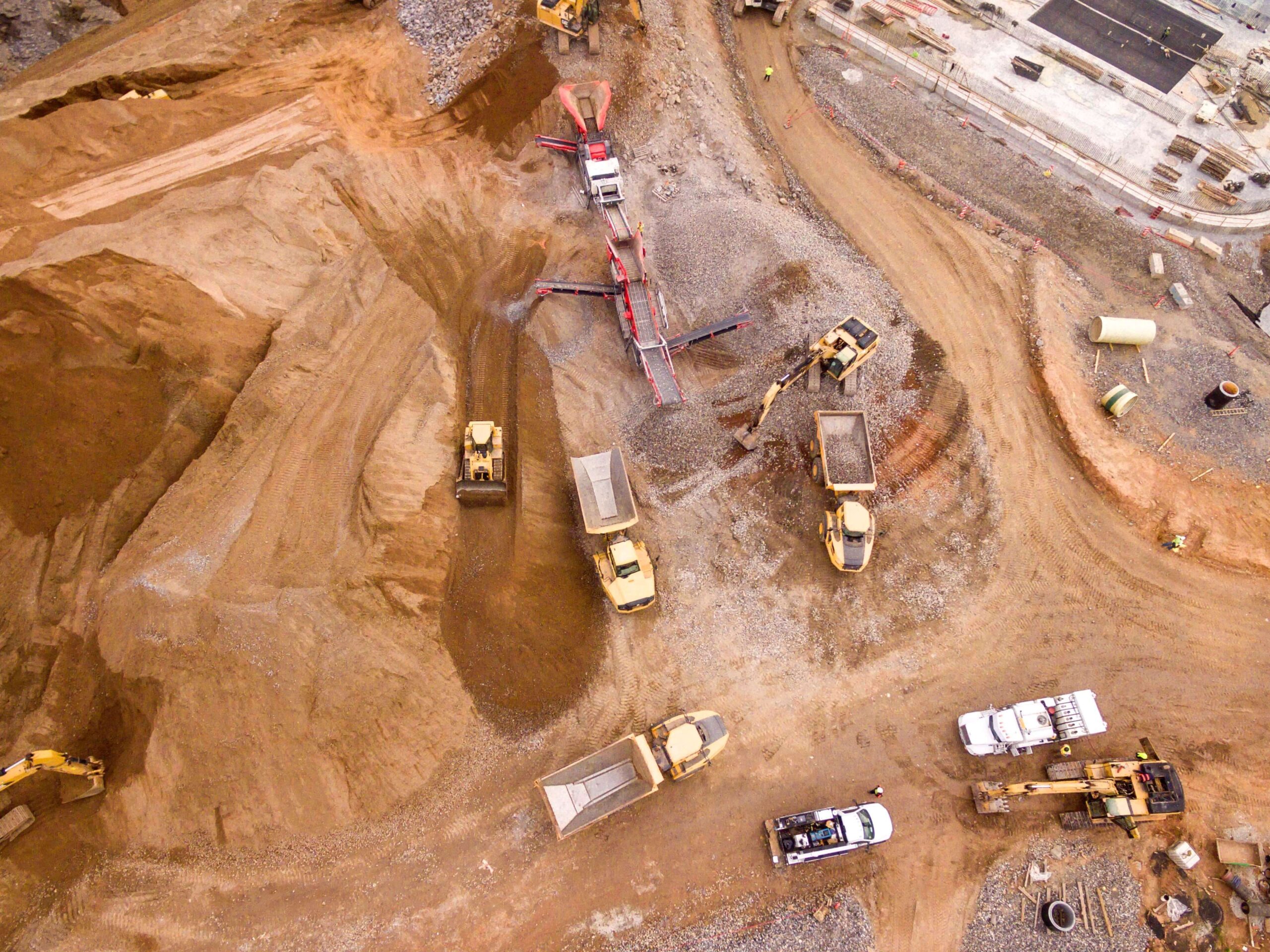 Mine Image with Trucks and Earth Movers - Bird Eye view